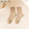 Calcetines medias de mujer algodón otoño e invierno amantes calcetines de color liso medias de chicas japonesas venta al por mayor