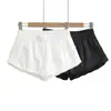 2693-26 Verano Estilo Puro Deseo Botón Encaje Lazo Pantalones Cortos Sueltos Estilo Juvenil Pantalones Cortos con Ribete de Encaje y Botones