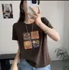 Venta al por mayor más vendido Copo de Nieve Algodón Caliente Rhinestone Caliente Estampado Nuevo Más Vendido Manga Corta Ropa para Mujer Camiseta Top