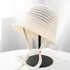 Sombrero de pescador de punto calado minimalista coreano para mujer, estilo casual con cordones, hace que la cara se vea más pequeña, tiene un aspecto de alta gama, adecuado para vacaciones