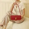 Bolso de axila de nicho de alta gama estilo coreano, bolso de mano versátil chic vintage, bolso baguette simple personalizado para el día a día