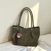 Bolsa tote para通勤者 transfronteiriço, grande capacidade, novo estilo 2026, bolsa de mão fashion, bolsa de ombro e bolsa tipo balde versátil para uso diário