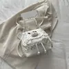Mochila Fofa Retrô 2026 Nova Tendência Fashion Pequena Bolsa Escolar Casual Versátil para o Dia a Dia Mochila Feminina