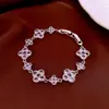 Pulsera de diseño nicho con flor de circón estilo francés, simple y versátil, pulsera exquisita de nácar, joyería de lujo ligero y alta gama