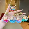 Llavero Creativo Serie Océano Relleno de Aceite Pez Payaso Estrella de Mar Pez Pequeño Colgante de Bolso Decoración de Llavero