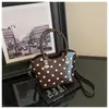 Bolso de mano de lunares de nicho estilo coreano transfronterizo para mujer, nuevo bolso cubo vintage de moda para el día a día, bolso de hombro y cruzado