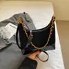 Bolso de hombro Shuai Mi Jia de nicho en forma de media luna, bolso tipo empanada, nuevo bolso de hombro colorblock 2026, bolso de hombro casual, bolso de mano para el trabajo