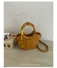 Bolso pequeño de patrón tejido transfronterizo para mujer, nuevo estilo, moderno, elegante, con asa, diseño de cubo, estilo nicho, bandolera cruzada