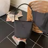 Bolsa Saco Retrô Simples Bolsa de Mão Casual Bolsa Feminina 2026 Nova Coleção Primavera e Verão Bolsa Feminina de Nicho Tendência Bolsa de Ombro
