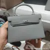 Bolsa Kelly Segunda Geração Padrão Palmeira 2026 Modelo Novo Bolsa Feminina de Alto Padrão Mini Bolsa de Mão Bolsa Transversal Texturizada para Mulheres