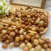 Raíz de Bodhi cuentas sueltas diy cuentas de pastel de arroz alrededor del dedo texto suave cuentas para jugar verde degradado quema de carbón Duobao bodhi mano