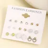 Nuevo juego de pendientes de tono dorado de lujo ligero para mujer, corazón de rosa perla estilo ins, combina a tu gusto, chica delicada, venta al por mayor