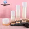 Set de botellas redondas de vidrio en stock de 30-120 ml para agua, loción y esencia, frascos vacíos de 30 g y 50 g para crema facial, materiales de embalaje
