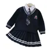Conjunto JK para Meninas Outono Novo Estilo Crianças Pequenas e Grandes Estilo Escolar Hoodie Falso de Duas Peças Saia Plissada Conjunto de Duas Peças Roupa de Estudante