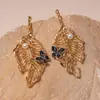 Pendientes de Perla Mariposa con Goteo de Aceite Estilo Aguja de Plata Europeos y Americanos Transfronterizos, Pendientes de Lujo Ligero de Gama Alta, Pendientes de Diseño Exagerado con una Estética de Nicho