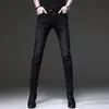 Jeans preto de alta qualidade para negócios masculino de Hong Kong, nova coleção de outono, calça comprida elástica slim-fit versátil, estilo moderno