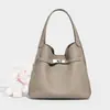 Bolsa Tote de Grande Capacidade com Design de Nicho Estilo Casual de Luxo Estilo Preguiçoso Fechamento com Trava Bolsa de Ombro Único Transversal Cesta de Produção