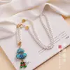 Nuevos Accesorios Chinos Qipao Brocado Song Colgante de Calabaza Collar de Perlas Estilo Étnico para Mujer Estilo Chino Temperamento Cadena Larga para Suéter