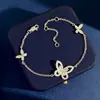 Pulsera Elegante de Lujo Ligero Estilo Coreano con Mariposa Fantasma Hueca de Diamantes Completos Diseño de Nicho Femenino Joyería Chapada en Oro de 18 Quilates Viento Frío