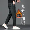 Jeans elásticos de 8/9 de largo para hombre Guangzhou Xintang, modernos y versátiles para primavera y otoño, de moda para personas bajas de 160 cm