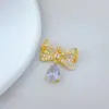 Colgante de Moño y Gota de Agua de Cobre y Oro Elegante Comercio Exterior Transfronterizo DIY Hecho a Mano Joyería Cobre Circonita Microincrustado Colgante Accesorio