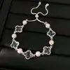 Pulsera de flor extraíble de circón y nácar estilo coreano, sensación de lujo ligero de nicho de alta gama, accesorio versátil para el día a día