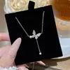 Elegante y Versátil Collar de Perlas Mariposa, Estilo de Nicho de Lujo Ligero, Cadena Dulce y Delicada para la Clavícula para Mujeres