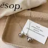 Collar con Colgante Doble de Gota de Agua Plateada para Mujer 2025 Nueva Cadena Larga para Suéter Accesorios de Alta Gama Simples y Versátiles