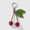 Nuevo Estilo Miu Exquisito, Dulce y Lindo Cuerda de Piel Sintética con Forma de Hoja Resina Brillo Fino Cereza Manzana Llavero DIY