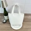 Bolso de Mano de Gran Capacidad para Mujer 2026 Otoño/Invierno Nuevo Versátil Bolso para el Trabajo Bolso de Hombro Bolso Popular de Tendencia Cubo de Este Año