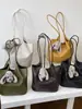 Bolso de hombro grande de verano 2026 para mujer, patrón tejido de nicho estilo coreano transfronterizo, elegante bolsa tote para ir al trabajo