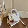 Bolso cuadrado pequeño, bolso de mano simple y elegante, verano 2026 simple moderno nuevo versión coreana retro personalizado bolso de hombro cruzado