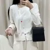 Hilo de tres cabos hilado en el núcleo súper bonito de punto para principios de primavera, cárdigan de punto irregular nuevo de otoño e invierno para mujer, top base para mujer