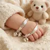 Tienda de regalos para madres y bebés pulsera redonda de imitación plata para niños pulsera de candado de longevidad para niños regalo para bebé de 234567 años