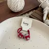 Cuerda para el pelo de cuadros versátil de otoño e invierno con botón para niñas, diadema pequeña dulce para el pelo, banda de goma de alta elasticidad, accesorios para el pelo