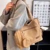 Bolsa de lona tipo tote para estudiantes universitarias, versátil y de gran capacidad, adecuada para ir al trabajo y llevar libros a clase, con cierre.