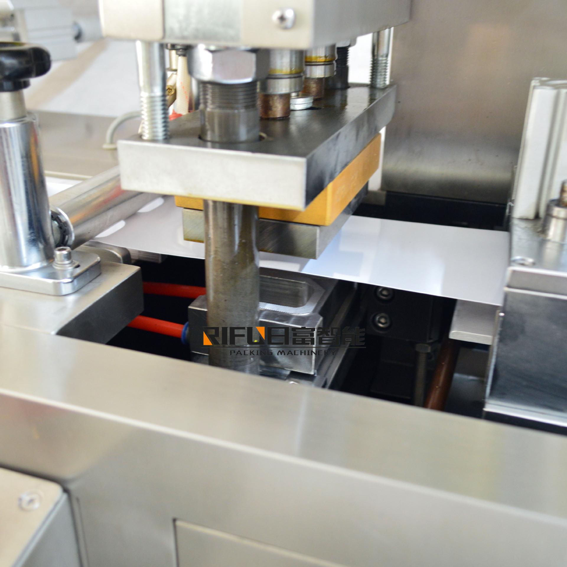 双头灌装泡罩机