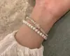 Pulsera de Perlas Plateadas Ultra Finas para Mujer 2026 Nuevo Estilo de Lujo Ligero de Alta Gama Nicho Exquisito Pulsera Apilable Accesorio