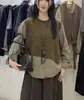 Las populares blusas de dos piezas falsas para mujer de este año son modernas y elegantes, sudadera holgada única nueva de 2026 con empalme de camisa