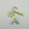 Llavero de Letras de Color Arcoíris Primavera Verde Letras Inglesas Pegamento Mariposa Joyería Cristal Amazon Colgante