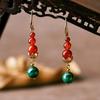Pendientes de ágata roja retro de Yunnan, estilo étnico, sencillos y elegantes, pendientes largos con colgante de pavo real para mujer