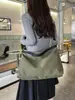 Bolsa de lona estilo japonés y coreano, una bolsa de nicho para mujer de gran capacidad, simple y a la moda, adecuada para uso casual y como bolsa de estudiante
