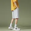 Pantalones cortos deportivos de verano para hombre, color liso, tendencia, pantalones holgados, moda juvenil, casual, pantalones de playa, una generación de pelo
