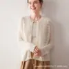 Cardigã feminino de cashmere 100% puro cashmere de cabra, novo estilo outono e inverno, gola redonda, design vazado, casaco suéter de tricô moderno de manga longa