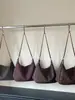 Bolsa de grande capacidade transfronteiriça, bolsa tote com corrente da moda, nova coleção outono 2026, bolsa de ombro/transversal casual retrô para o dia a dia