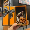Miu Anillo de Llavero de Pan con Agua Alcalina Resina Pan Colgante de Llavero de Bolsa de Chocolate Regalo de Graduación