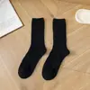 Calcetines de lana para mujer estilo coreano con estampado de puntos ins, calcetines de media pantorrilla, otoño e invierno, engrosados, cálidos, retro, hechos en China, calcetines de felpa