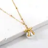 Otoño europeo y americano nuevo personalidad creativa exquisito simple acero inoxidable dorado lazo cruz moda transfronteriza caliente collar de perlas