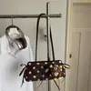 Bolso de mano de alta gama para mujer, nuevo y moderno 2026, bolso de hombro versátil para el día a día, bolso de axila de lujo ligero y elegante