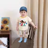 Traje Deportivo para Bebé Verano Estilo Delgado Conjunto de Dos Piezas Pantalones Cortos de Manga Corta para Bebés Ropa Nueva de Verano para Niños 2026